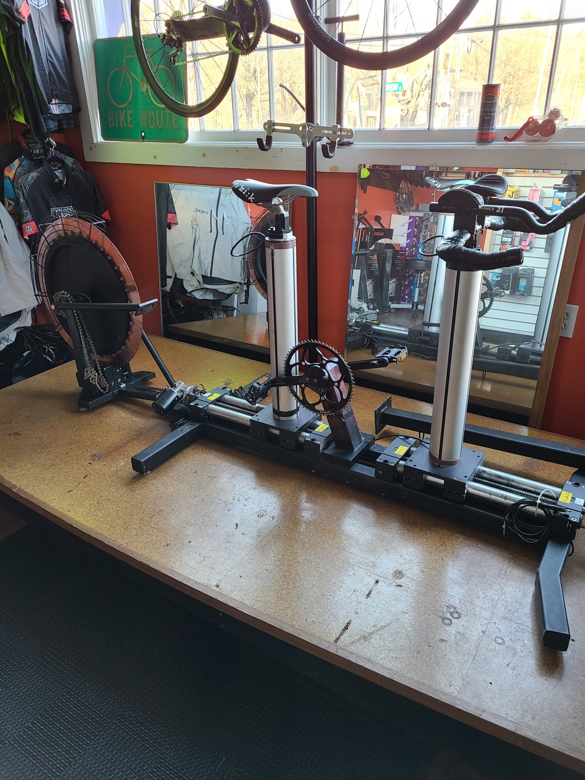 medium shot man repairing bike